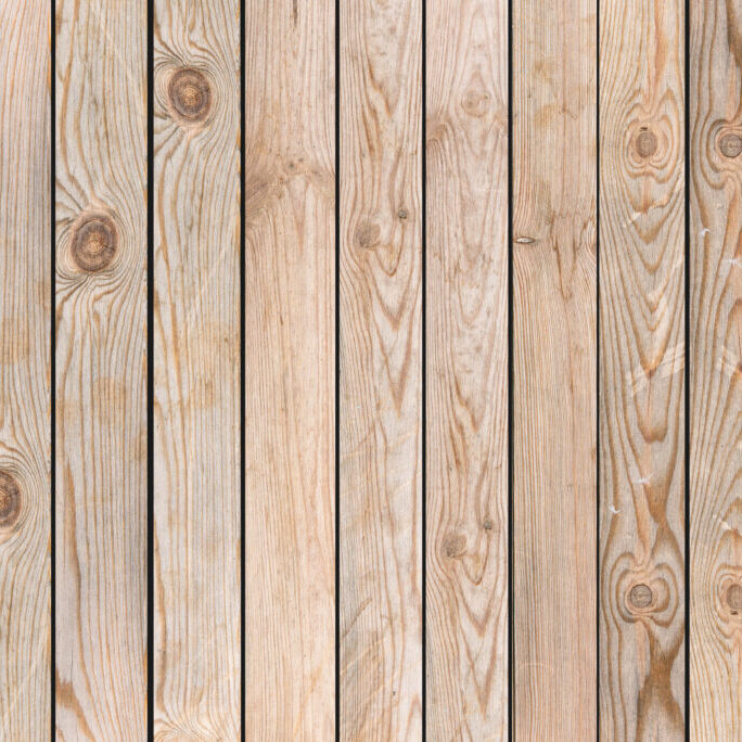 A close up of the wood grain on a fence.